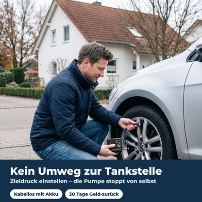 Mann pumpt Autoreifen in der Einfahrt mit der Akku-Pumpe auf